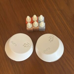 Pura Set. Two pura units and 6 bottles of scents.